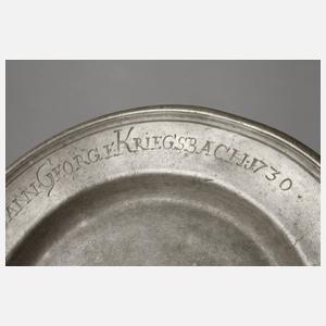 Zinnteller eines Bäckers