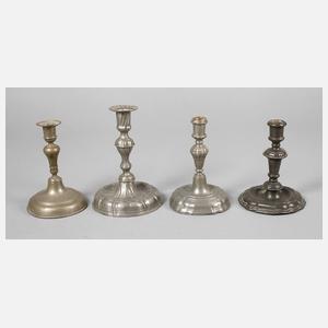 Drei barocke und ein Zinnleuchter Biedermeier