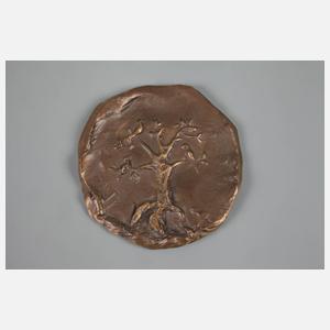 Drei Bronzeplaketten