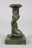 Bronzeleuchter kniender Putto