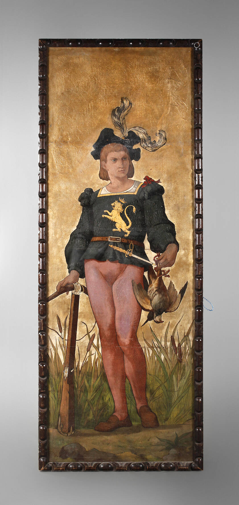 Junger Jäger am Seeufer