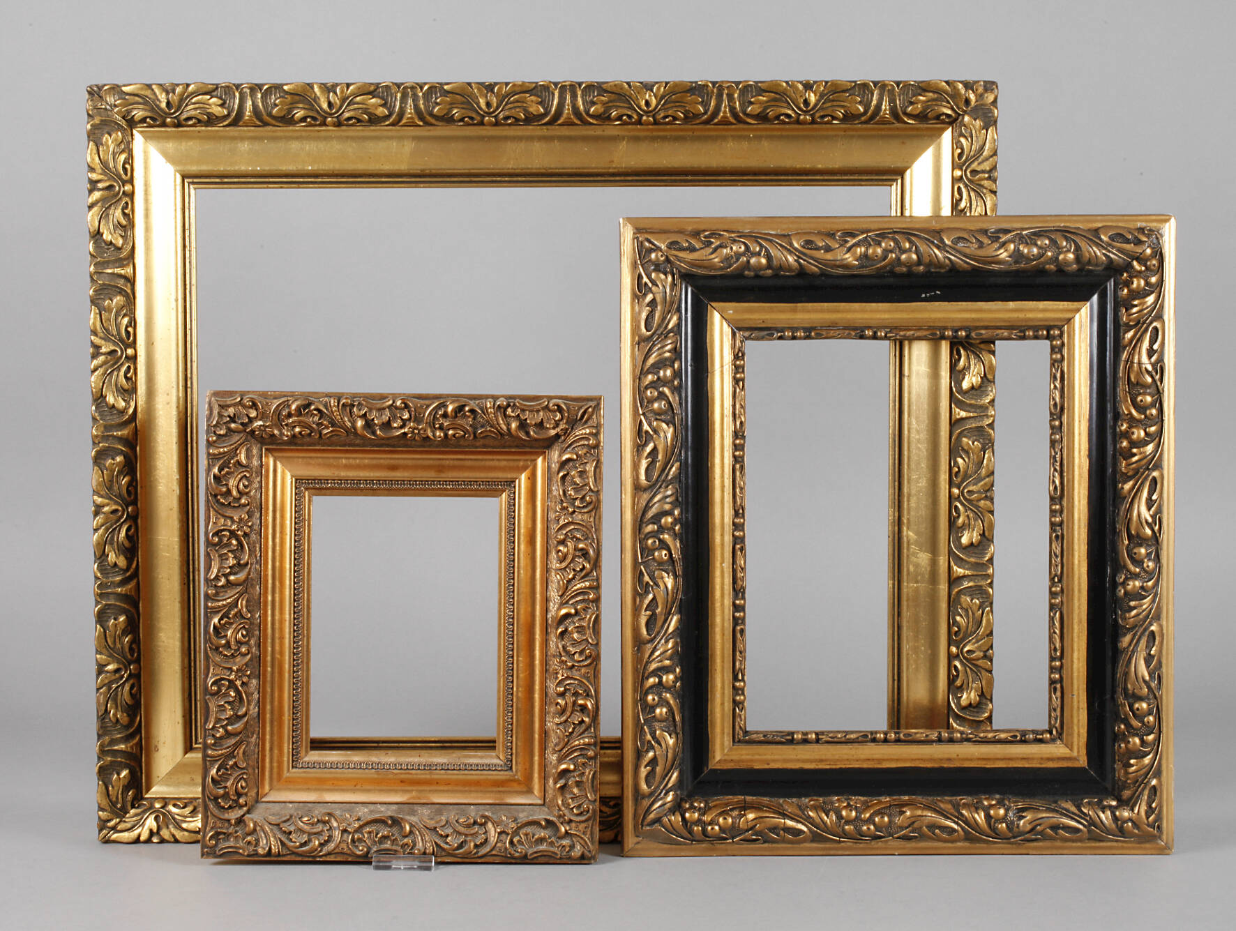 Drei Goldstuckleisten um 1920