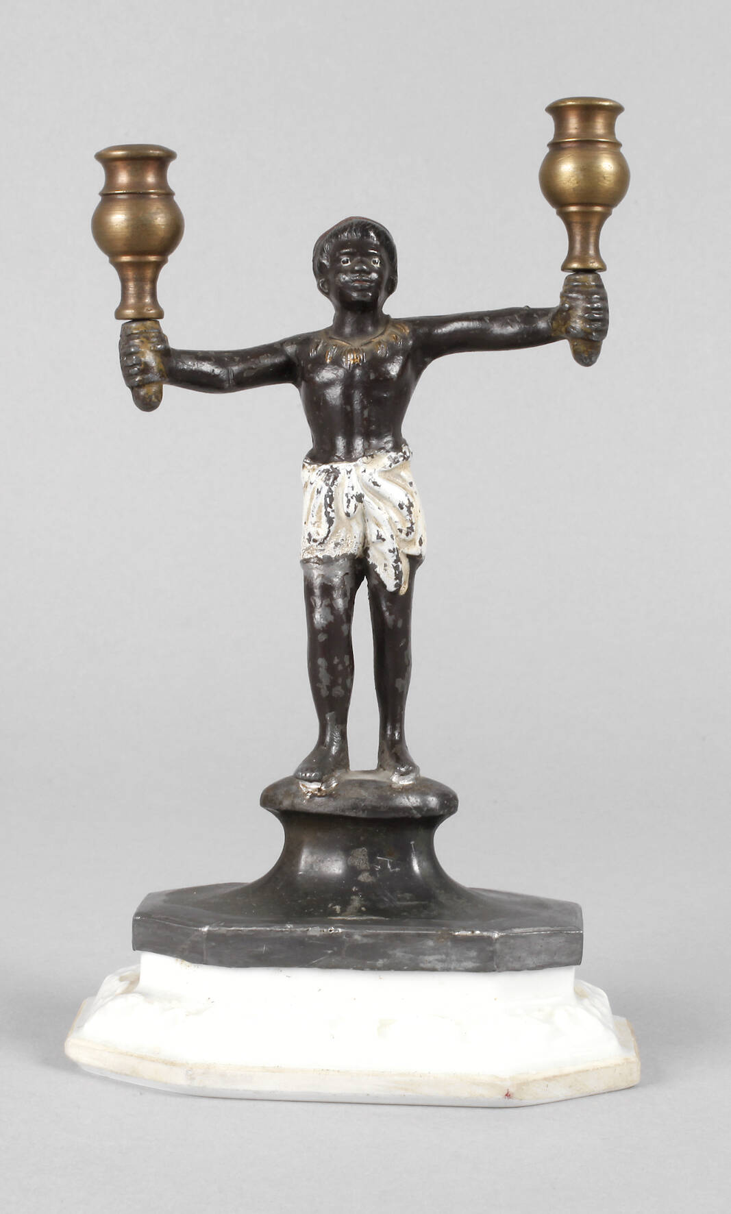 Kleiner figürlicher Leuchter