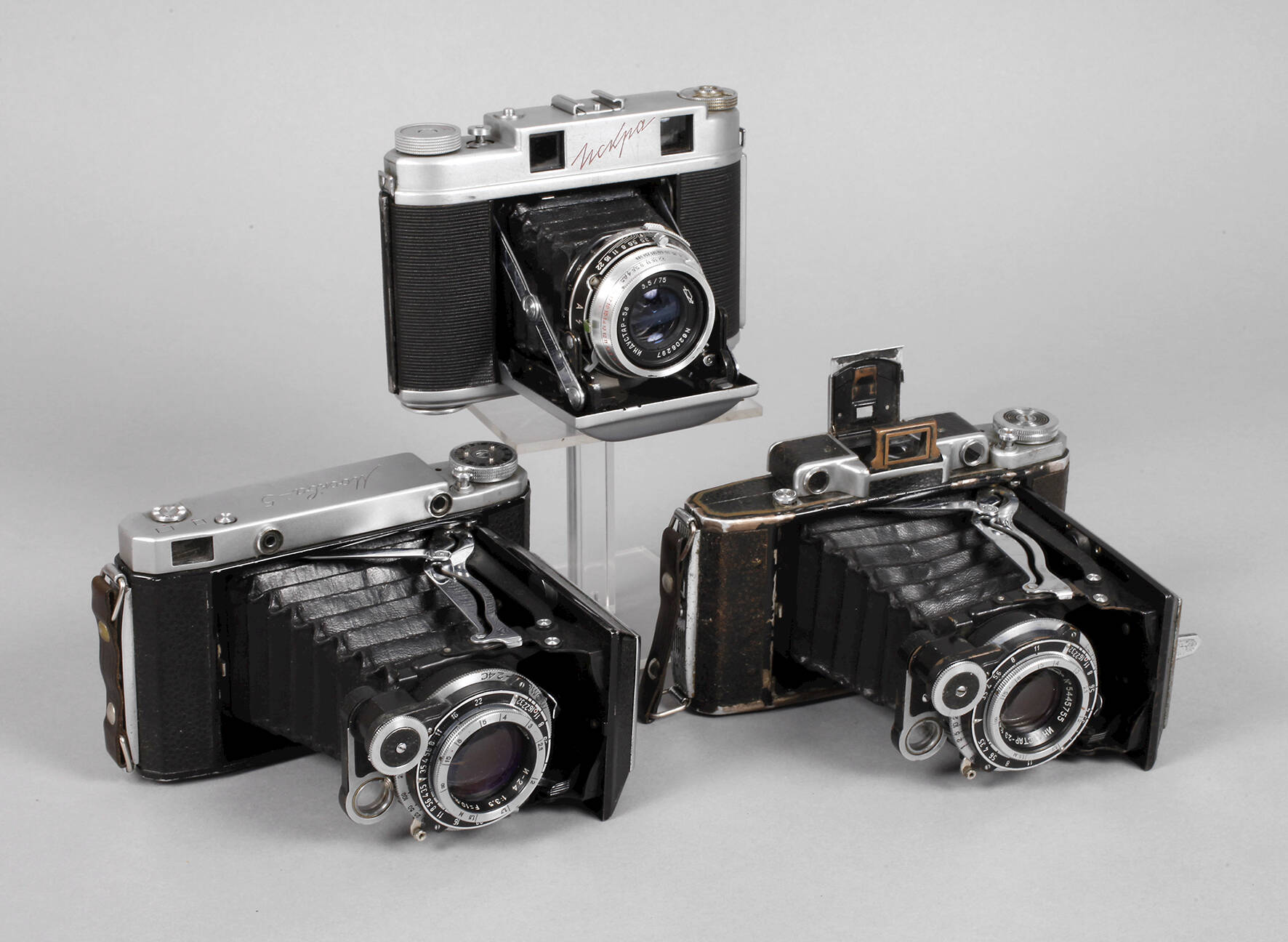 Drei Fotoapparate
