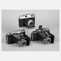 Drei Fotoapparate111