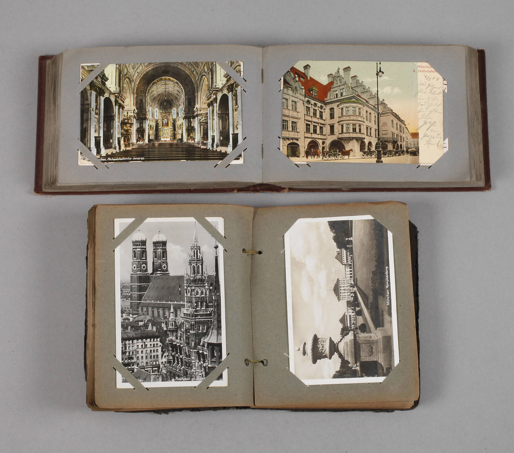 Zwei Ansichtskartenalben München