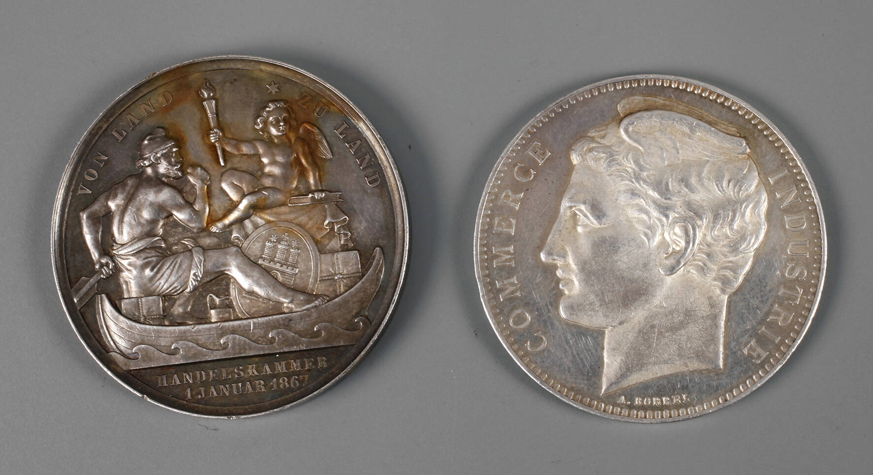 Zwei Silbermedaillen auf Industrie und Handel