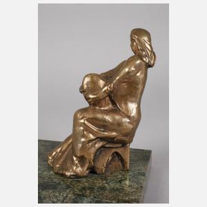 Sitzende Bäuerin mit Brotlaib