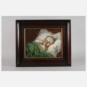 Kleinkind im Bettchen