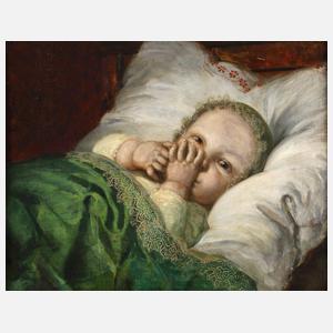 Kleinkind im Bettchen